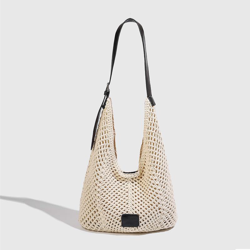 Sommer neue Strandurlaub Nische Hohl Strandtasche Damen Große Kapazität Tragetasche Handgewebte Tasche