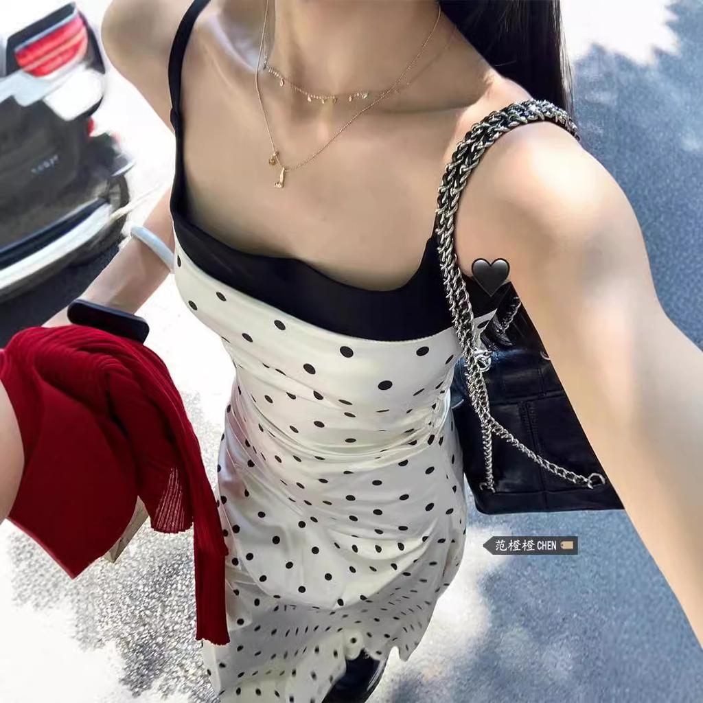 Pure desire style temperament polka dot suspender dress women's summer new design sense splicing waist showing thin long skirt tide