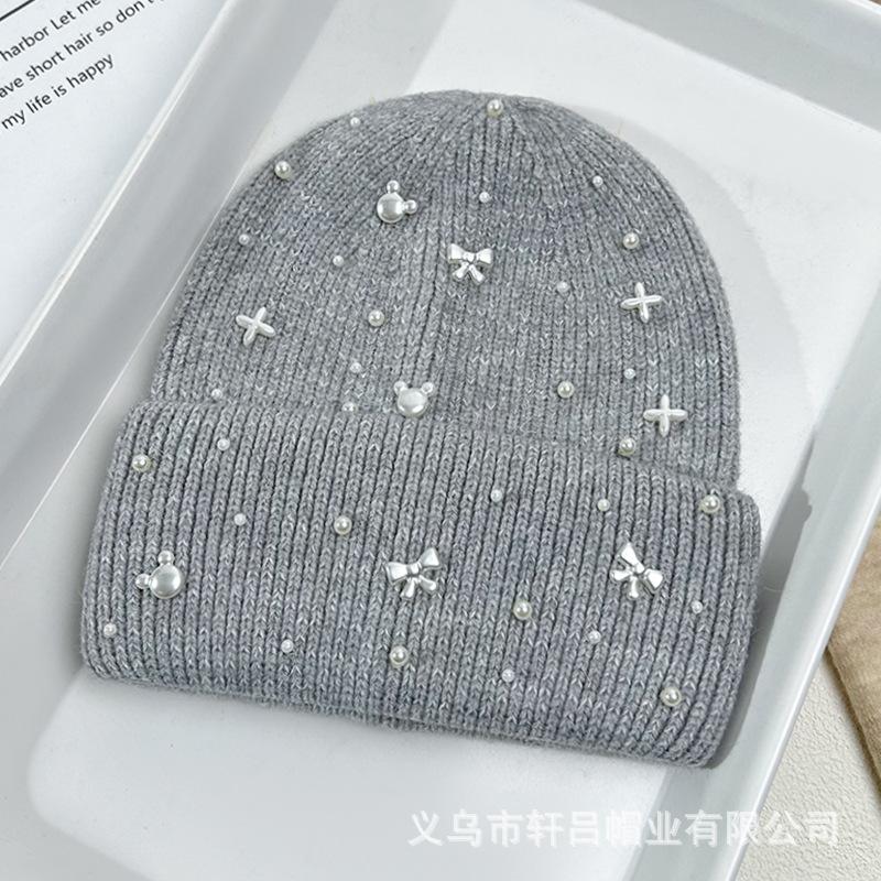 Autumn and winter new bow pearl knitted hat big head circumference thickened rabbit hair blended pullover ear protector wool hat