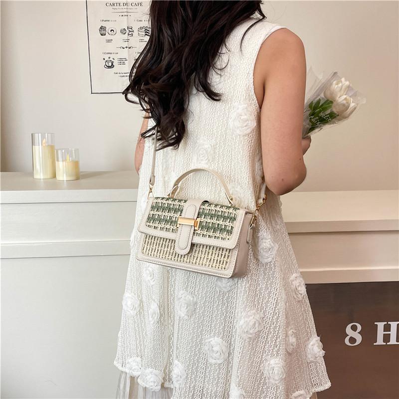 Woven flip straw bag niche women's shoulder messenger bag seaside resort wind hand-woven bag