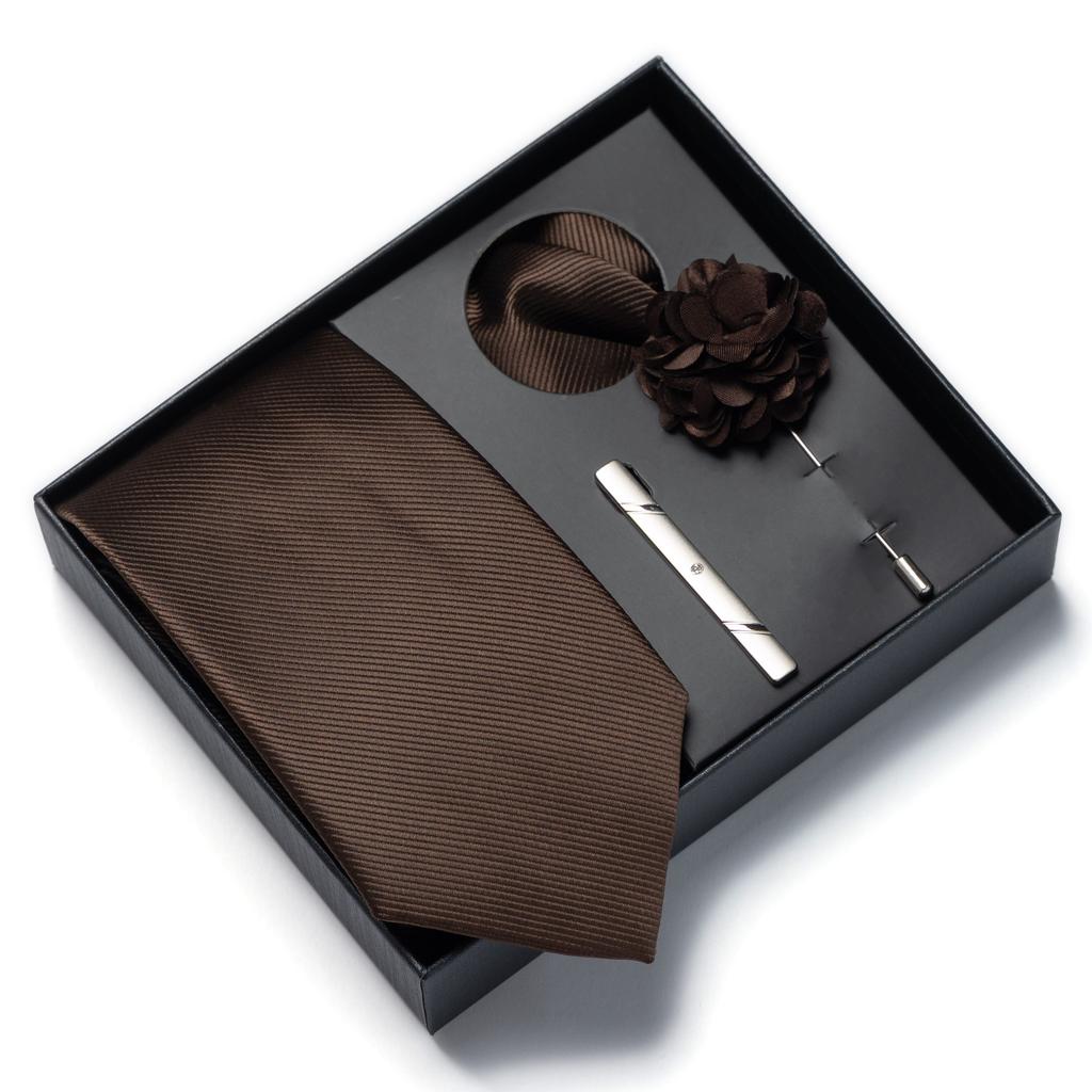 This solid color 4-piece men's tie gift set includes a brooch, corsage, and handkerchief. It's a perfect gift for Valentine's Da