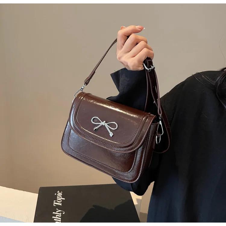 

Популярная сумка Женская модная тенденция Универсальная женская сумка через плечо Нишевый дизайн Супер огонь Высококачественная маленькая квадратная сумка