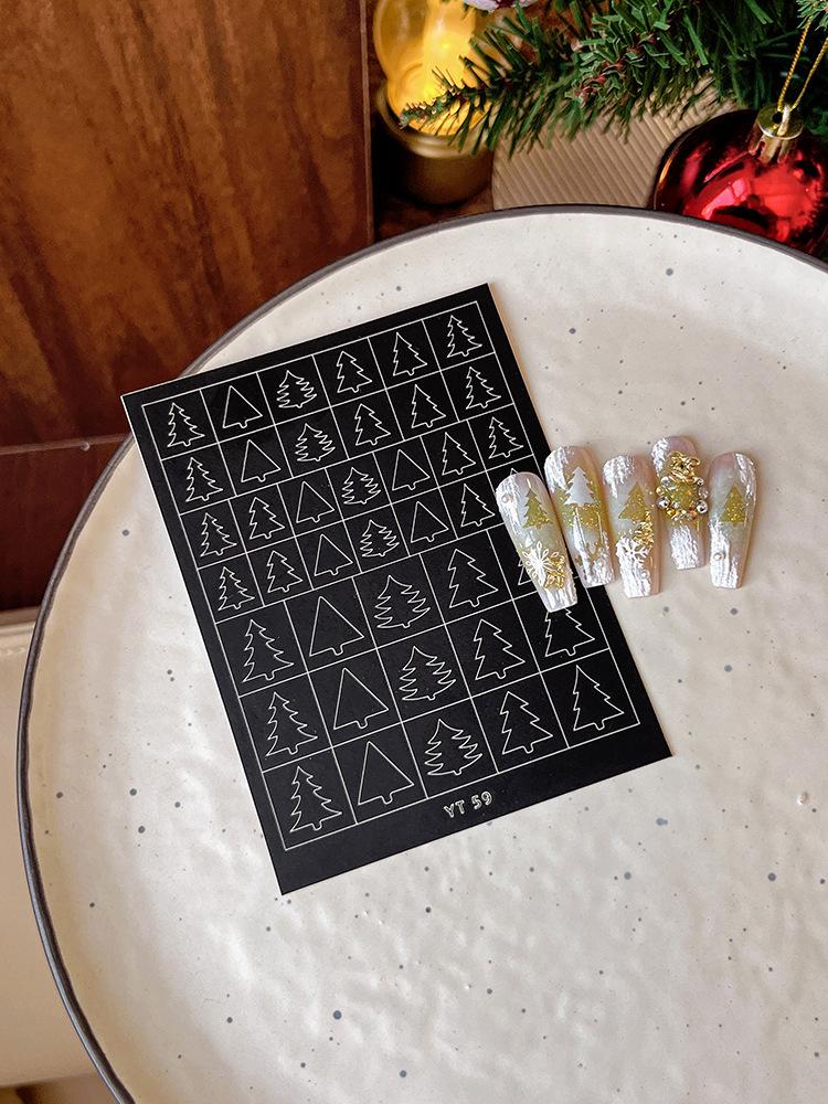 

Аксессуары для ногтей: Самоклеящиеся наклейки, рисунки со звездами и бабочками, клеевые подушечки, аэрозольная краска, мелкие элементы декора Christmas Tree Hollow (YT-59)