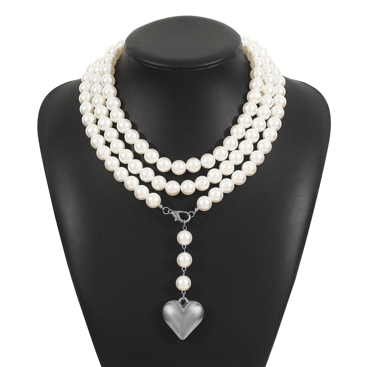 

Creative pearl long sweater chain, elegant temperament, love-shaped necklace for women