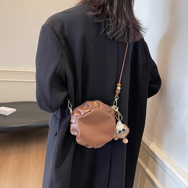 Niche cute girl pleated small round bag design sense small bag women 2025 new trendy shoulder messenger bag
