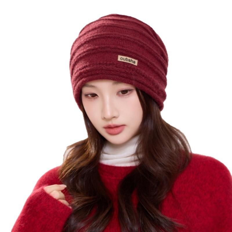 Winter new versatile solid color cloth label strap stacking hat women's thickened warm knitted hat source