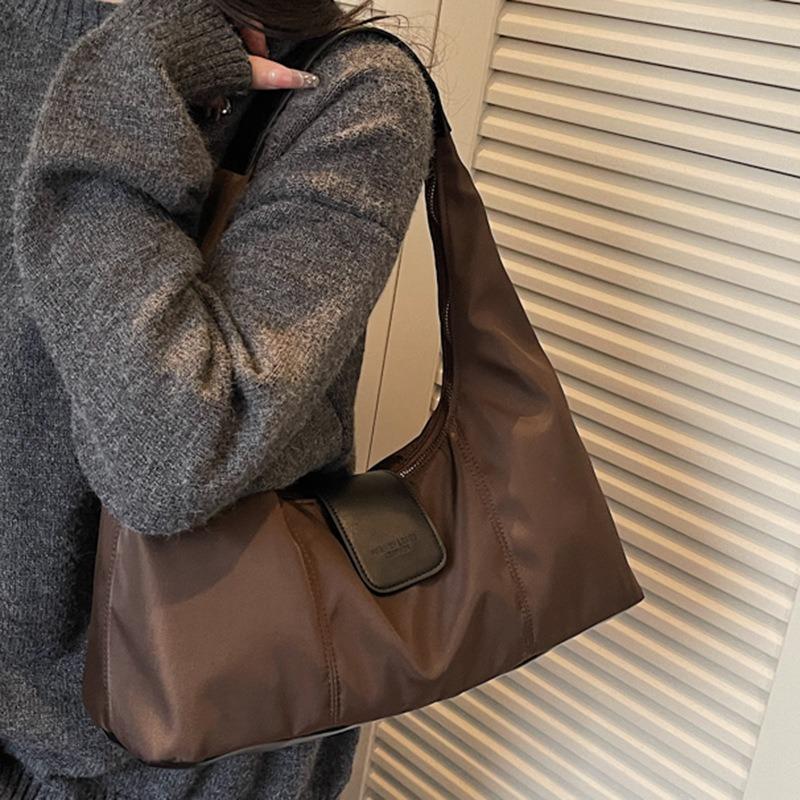 Hochwertige einseitige Achseltasche Damen Retro-Textur Große Kapazität Damen-Tasche Nischen-Tragetasche