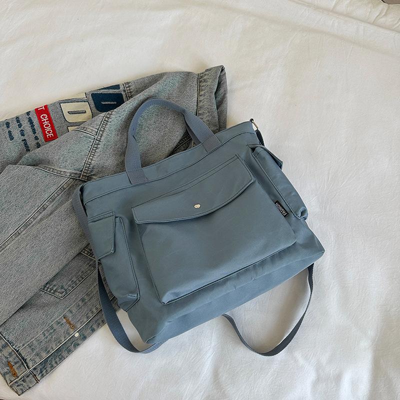 

Новий весняний тренд 2024 р. Сумочка в стилі ретро для студентів Сумка для репетитора Жіноча проста модна сумка через плече синій