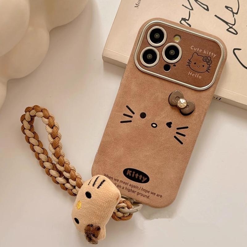 

MINISO Hello Kitty Phone Case For iPhone 16 15 14 12 13 11 Pro Max Brown Retro Artificial Leather Cover With Hand Strap For iPhone 15