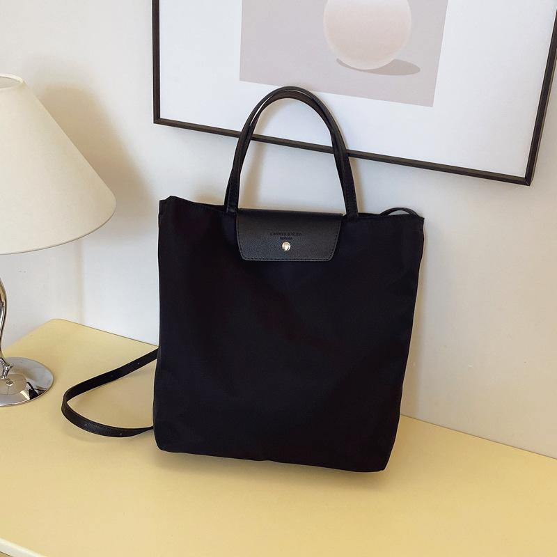

Bag women s new spring and summer niche nylon cloth shoulder underarm bag crossbody portable commuter tote bag чорний