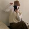 V-neck Knitted Vest for Women In Autumn and Winter, Loose and Lazy Style Wearing A Sweater and Vest Over A Pullover