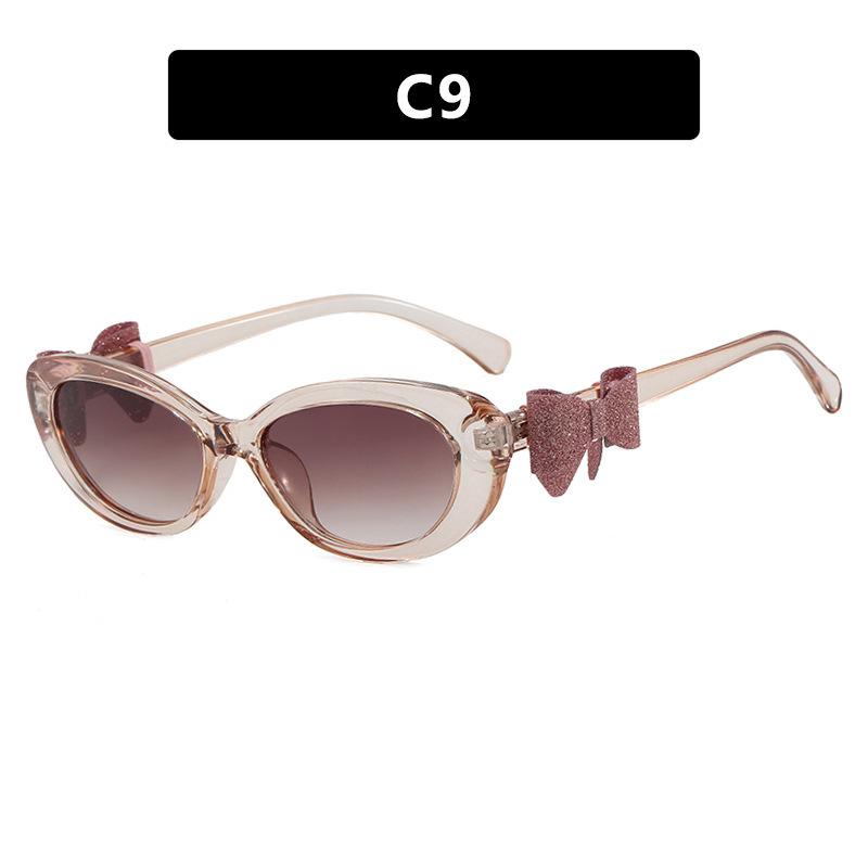 Fashion cat eye sunglasses bow decorative sunglasses women's high-end street photo UV-proof sunglasses
