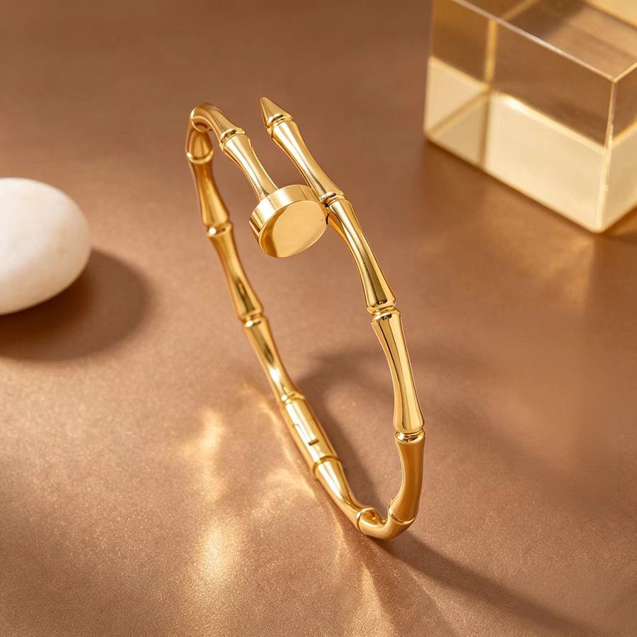 European & American Light Luxury Gold-Plated Titanium Bracelet Set: Bamboo Joint, Four-Leaf Clover, Cuban Chain Design for Women