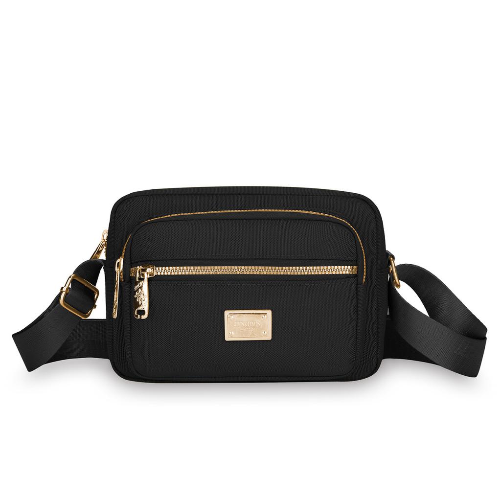 New Portable Oxford Cloth Mother Bag Fashion Simple Multi Layer Middle Aged Shoulder Bag Atmosphere Joker Slung Small Bag.