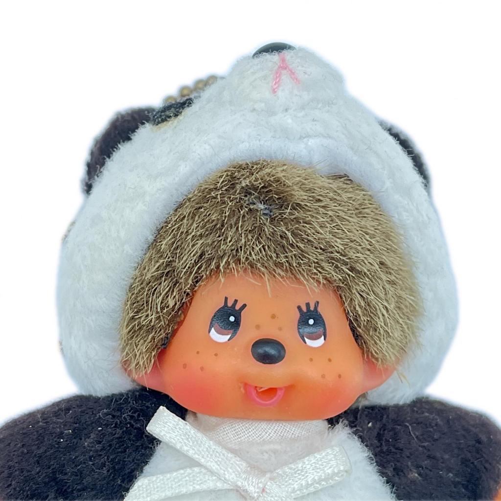 Gebruikte monchhichi panda sleutelhanger heeft vlekken zonneschade C rang.