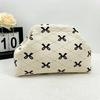 Knitted bag, striped clutch bag, women's flying woven clouds, versatile temperament, portable cosmetic bag, large capacity