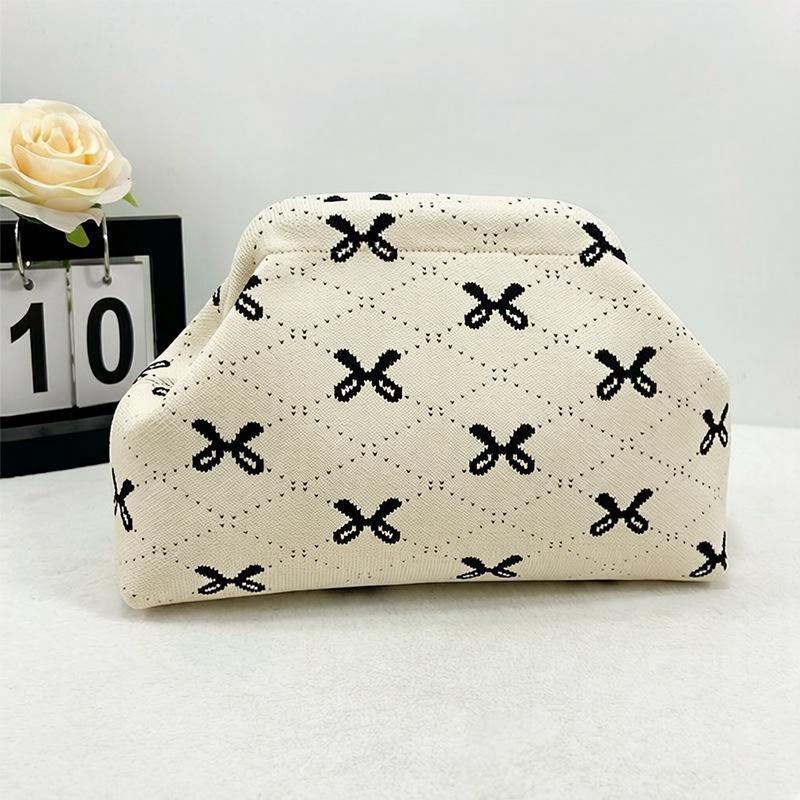 Knitted bag, striped clutch bag, women's flying woven clouds, versatile temperament, portable cosmetic bag, large capacity