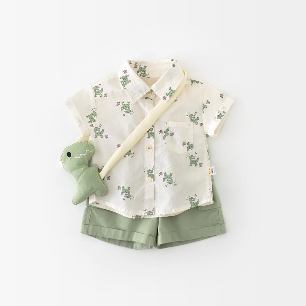 

Летний мальчиковый мультяшный комплект из двух предметов с коротким рукавом, комплект для малышей и детей ясельного возраста с полной печатью в виде маленьких динозавров, бесплатная кукла на ремешке. 100cm