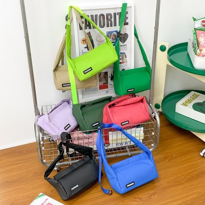 Lightweight Fashionable And Crossbody Bag For Kids Featuring Fun Letter Graphics And Modern Style