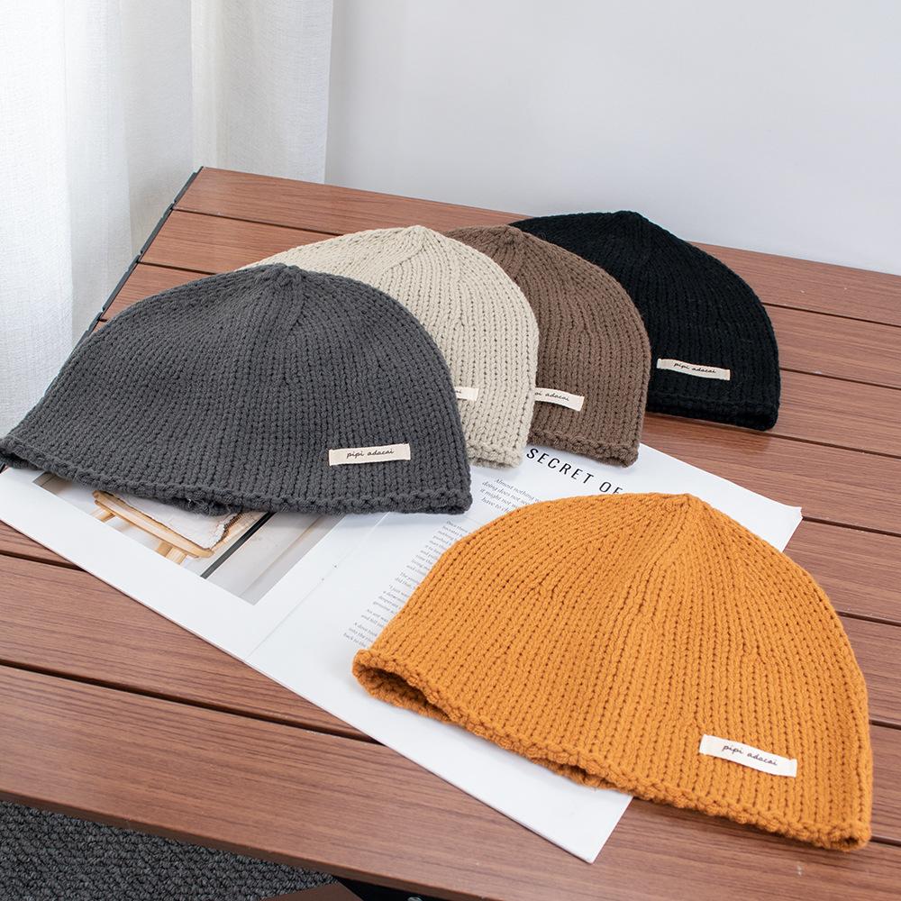 Simple solid color knitted bag head stacking hat women's early autumn new plain and versatile big head circumference showing face small wool hat