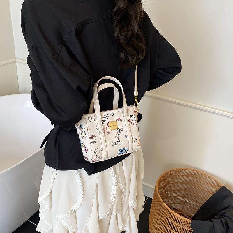 Niszowa designerska torba typu bucket z graffiti damska letnia nowa moda trendowa torba na ramię listonoszka