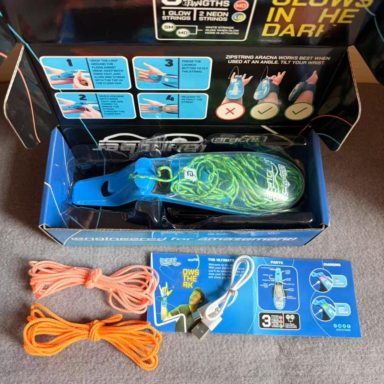 Elektrisks zirnekļa tīkla metējs, spīd tumsā