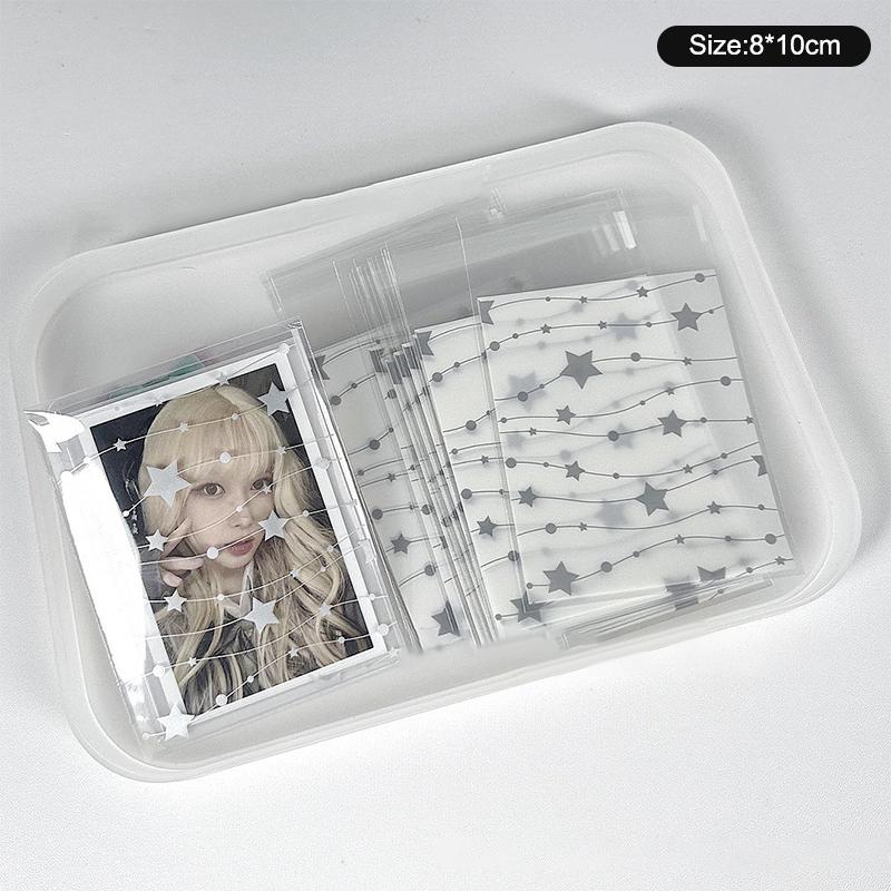 

50 шт./уп. Рукава для фотокарточек с бантиком и звездами, самоклеящийся пакет, обложка для карточек, протектор для фото айдола, подарочный пакет для упаковки ювелирных изделий