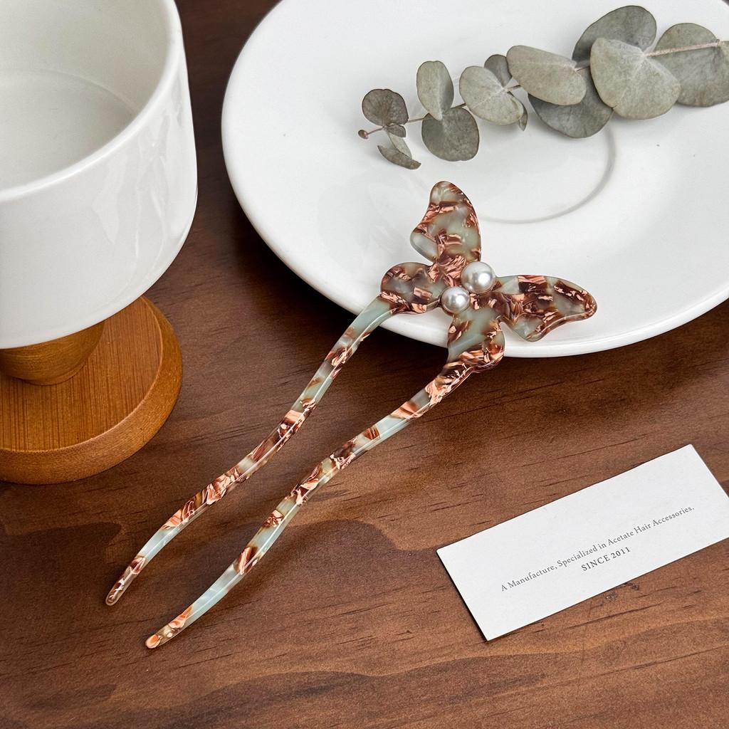 Elegant fjärilshårnål gjord av acetat med pärlinläggning Snygg U-formad hårpinne