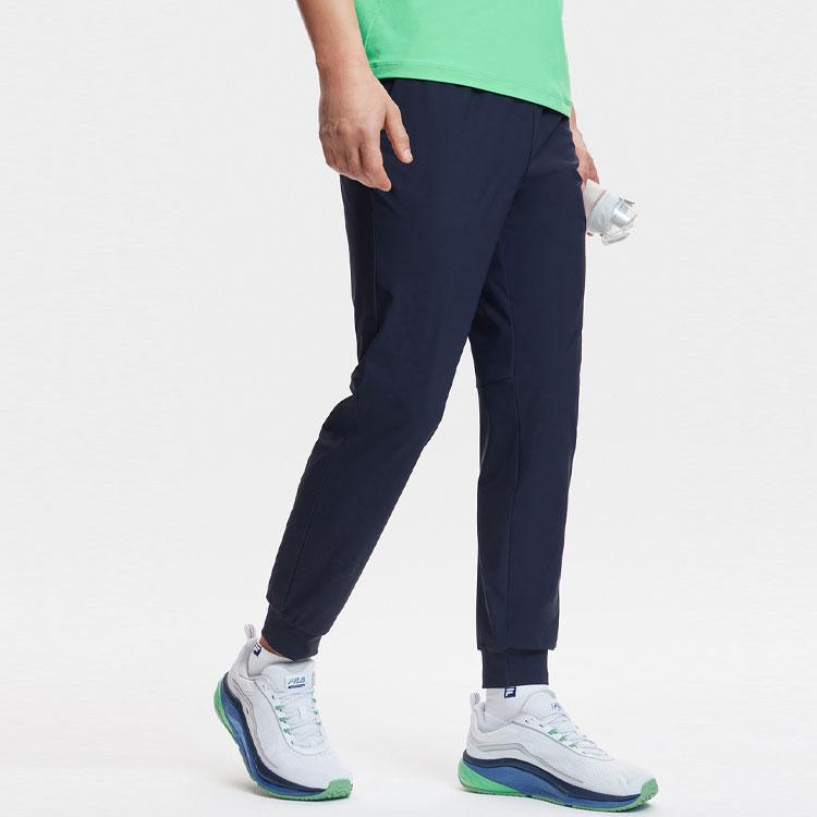 FILA Fitness Series Solid Color Mid-Rise UV Protection Tapered Knit Sports Pants Men bottoms Dark-Blue A11M421618F-NV