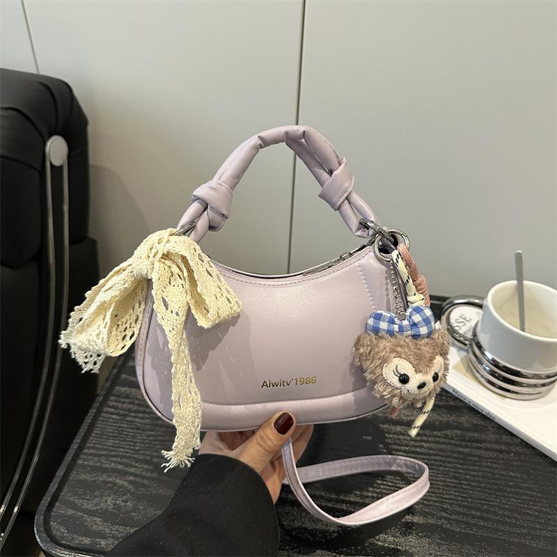 

Temperament simple and fashionable Korean version handbag 2025 spring new niche ins shoulder messenger bag crescent bag women Without pendant фиолетовый