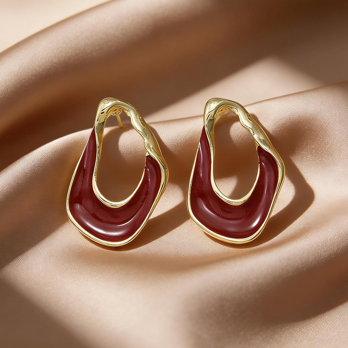 Premium atmosphere French retro drip glaze twisted oval earrings cold wind very simple stud earrings