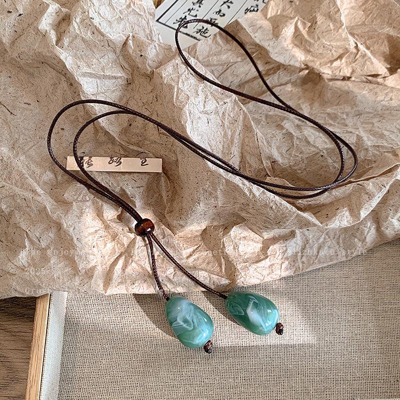 Women's Zen Retro Feather Necklace - Ethnic Layered Beaded Clavicle Chain, Long Bohemian Style