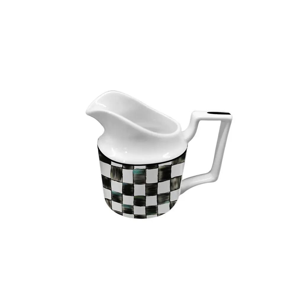 Piatto piano in ceramica a scacchi bianco e nero Tazza da caffè e piattino in bone china Piatti per cibi occidentali Stoviglie eleganti per la casa Tazza