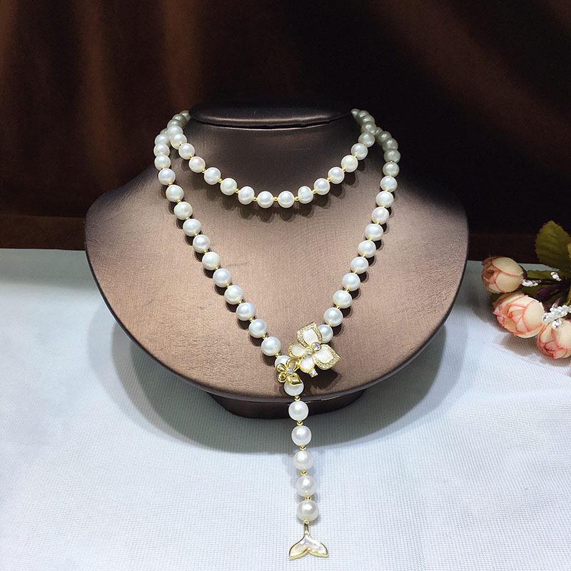 Fishtail Style Freshwater Pearl Sweater Chain: Adjustable, Versatile, 7-8mm Near-Round with Strong Luster and Minor Imperfections.