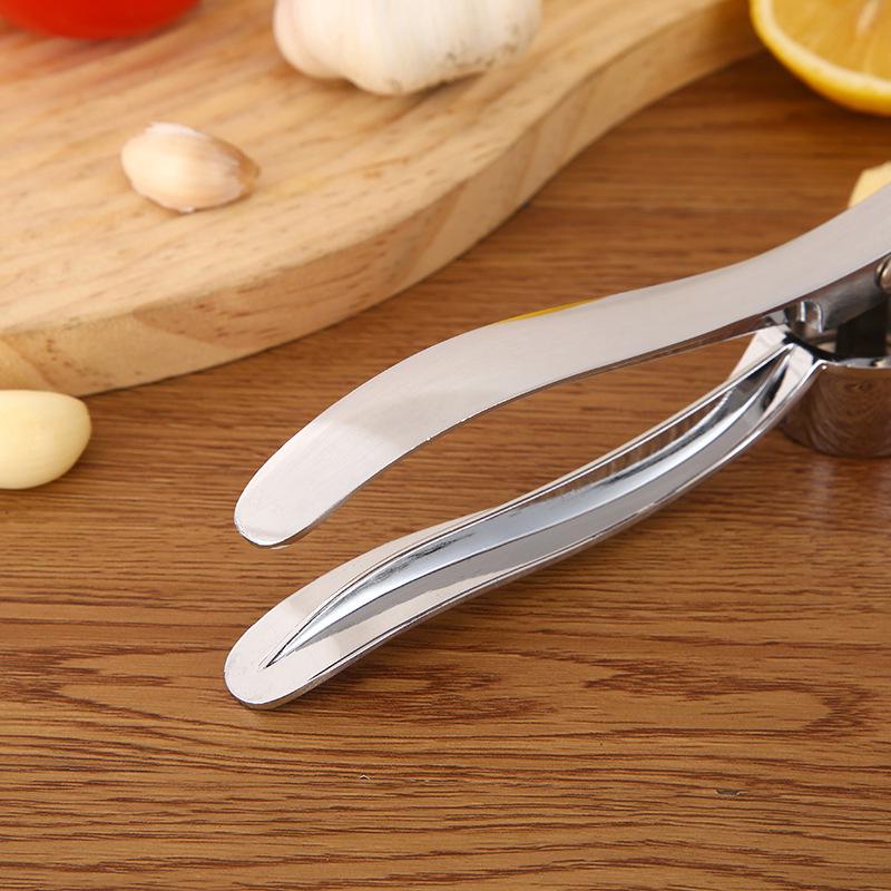 Newcomer Discount: Manual Garlic Press & Mincer - Durable Aluminum Alloy