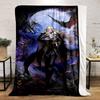 A vampire-like figure in black with supernatural creatures and a full moon. for all seasons blanket lunch break throw gift