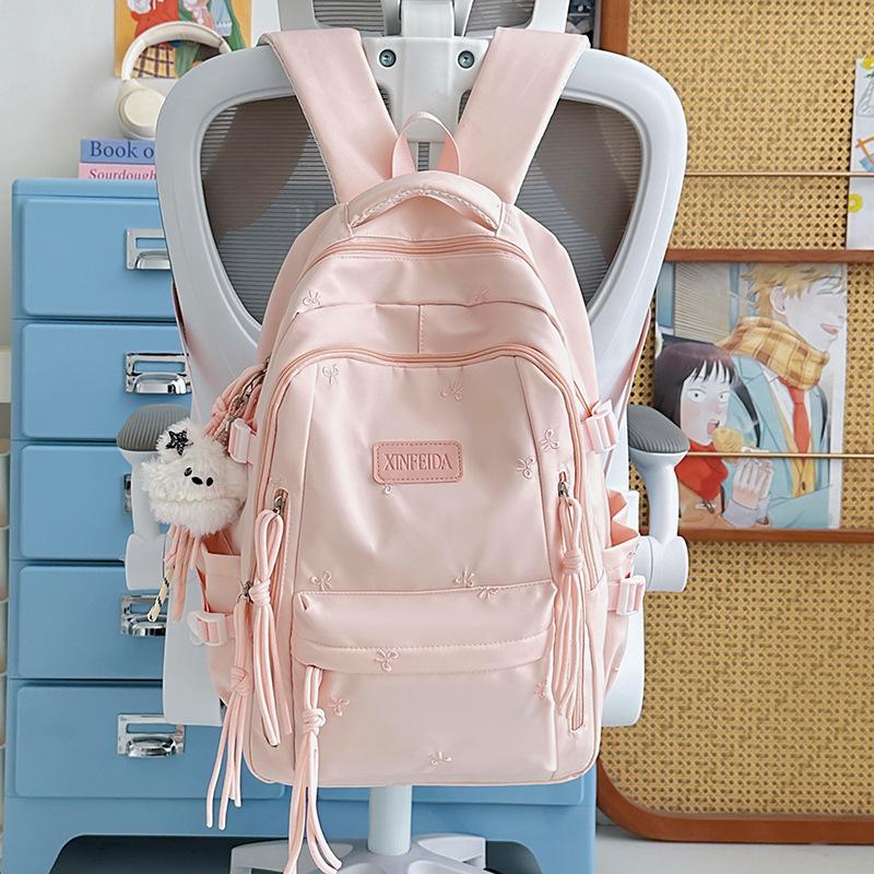 Schoolbag custom cute bow backpack student tutoring bag lightweight 1-1 grade three-piece backpack burden reduction