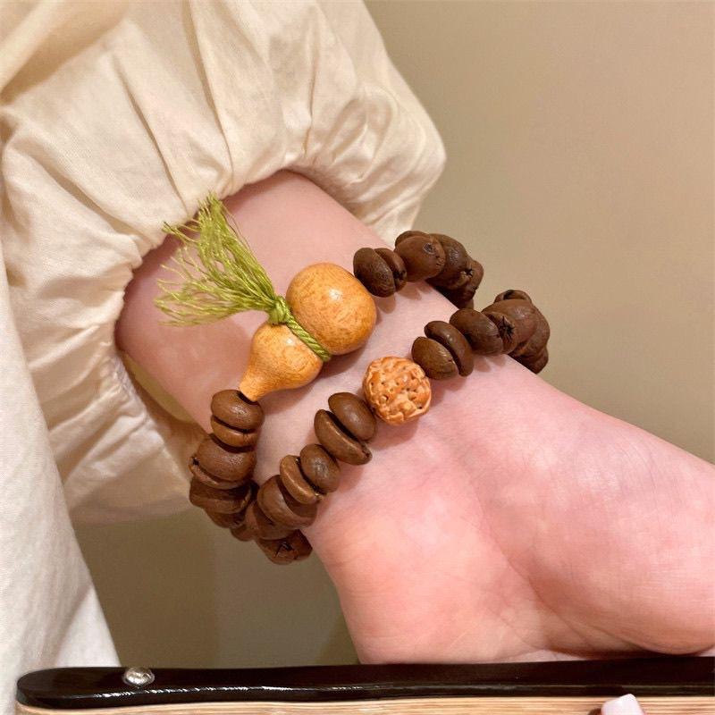 Original authentic coffee bean bracelet with Barbie sandalwood gourd Wenwan fashion jewelry Buddha bead bracelet.