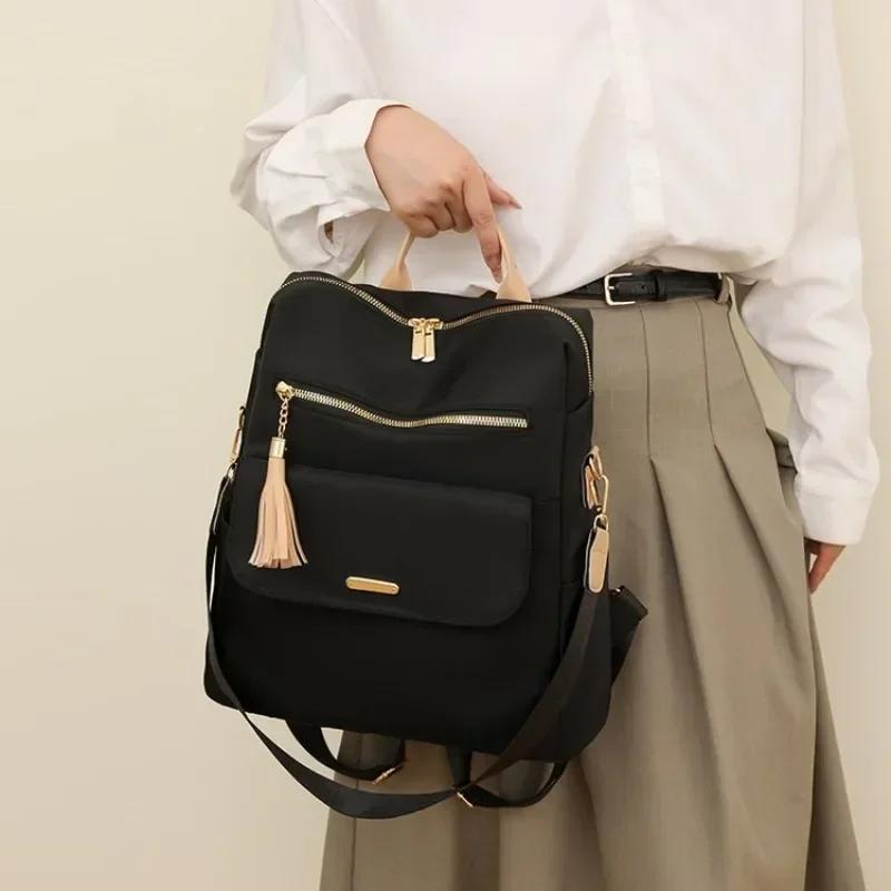 Nylonový zip Velkokapacitní Módní batoh Ležérní Všestranný Šicí nit Jednobarevný Střapec Design Vysoce kvalitní Měkká záda