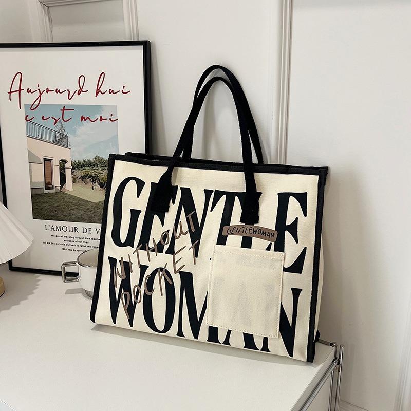 Neue Pendler-Tragetasche Cartoon bemalt Canvas-Tasche große Kapazität Schulter Achseltasche Trend