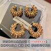 European and American Style Hollow Woven Twist Earrings Emerald Zircon Winding Shape Round Ear Buckle Retro Niche Earrings