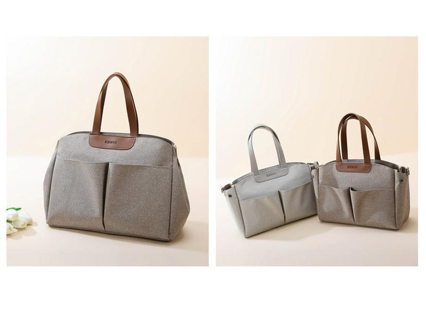 Modische multifunktionale Mamatasche: Isolierte Wickeltasche zum Tragen in der Hand, als Schultertasche oder als Messenger-Tasche für Mutter und Baby