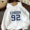 This children's casual hoodie featuresthenumber92andletterpatternsIt's warm comfortableandsuitableforspringautumnandwinter wear.