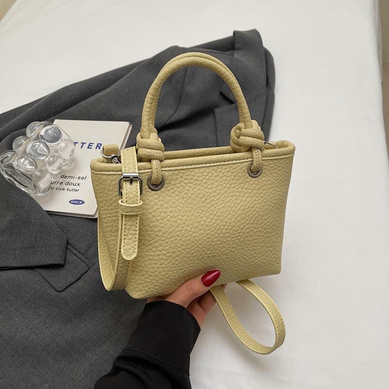 Fashion high-end hand bucket bag spring and summer simple and versatile shoulder bag trendy niche messenger bag