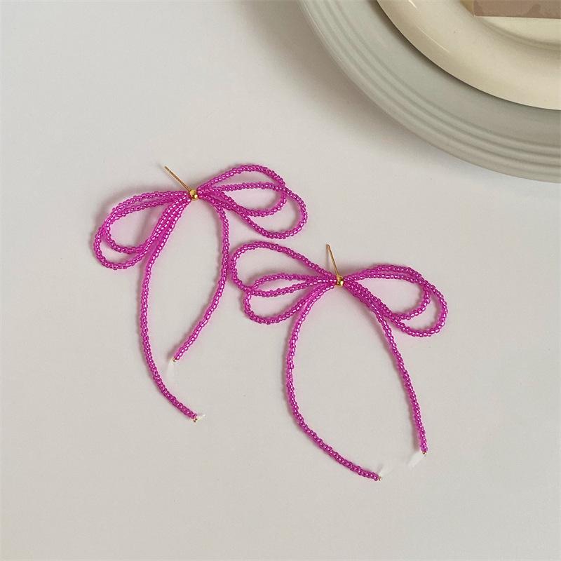 Gentle Temperament Beaded Bow Tassel Earrings - 925 Silver, Niche Design, Light Luxury, 2026 New Style