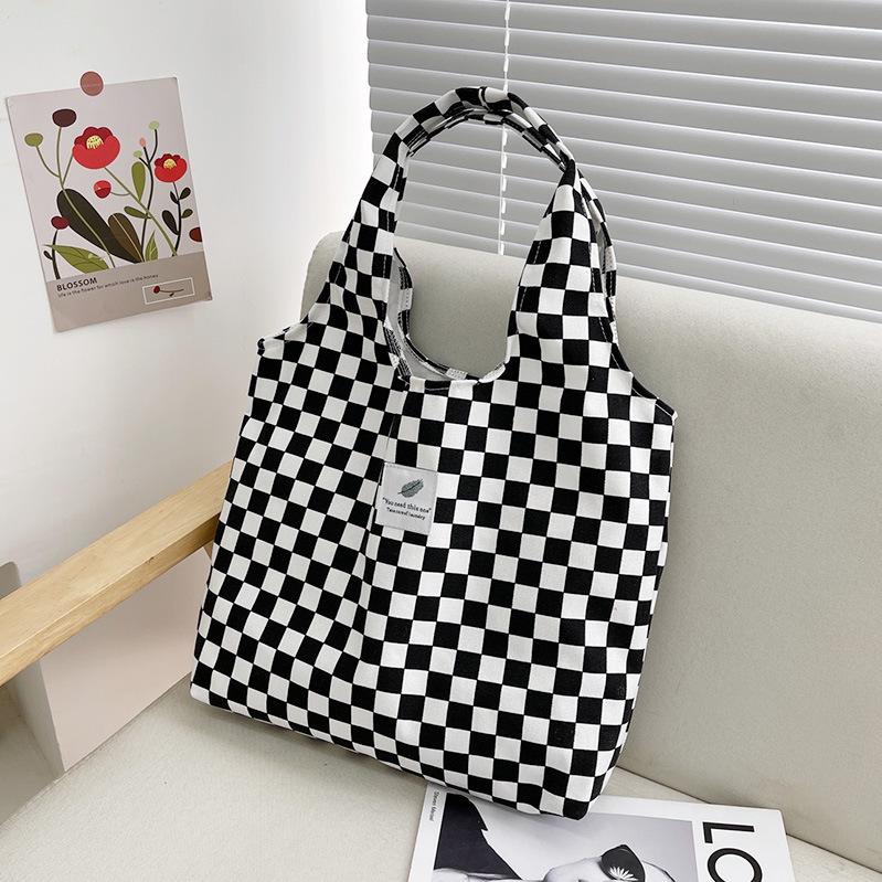 New shoulder portable large-capacity canvas bag summer women's bag simple checkerboard college style shopping bag