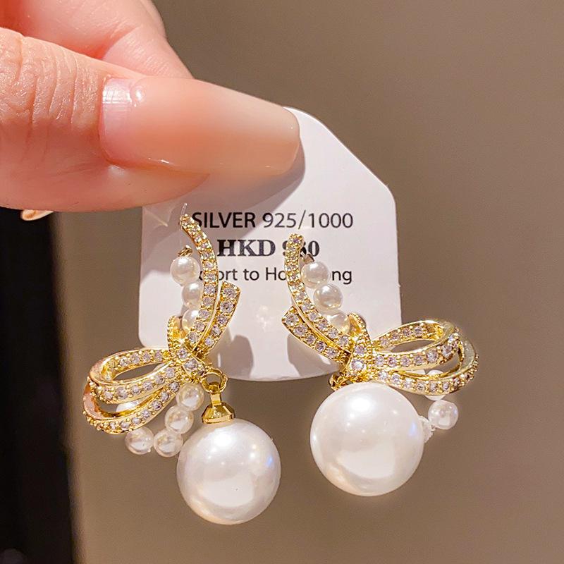 Gold-Plated Silver Bow Pearl Earrings: Retro, Elegant, and Luxurious Studs