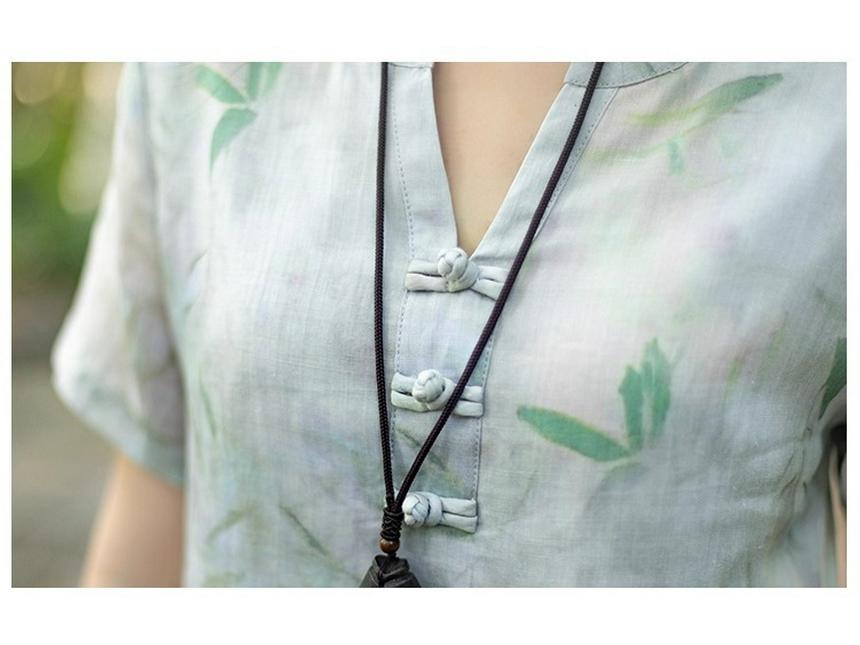 V-neck A-line Dress with Literary Bamboo Leaf Print and Frog Buttons