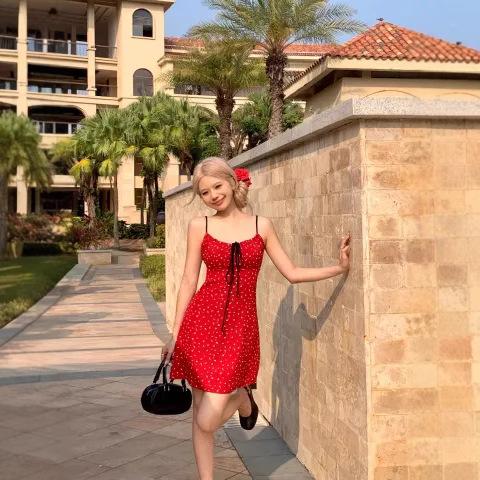 Red seaside vacation wind floral suspender dress female summer spice girl waist thin straps short skirt tide