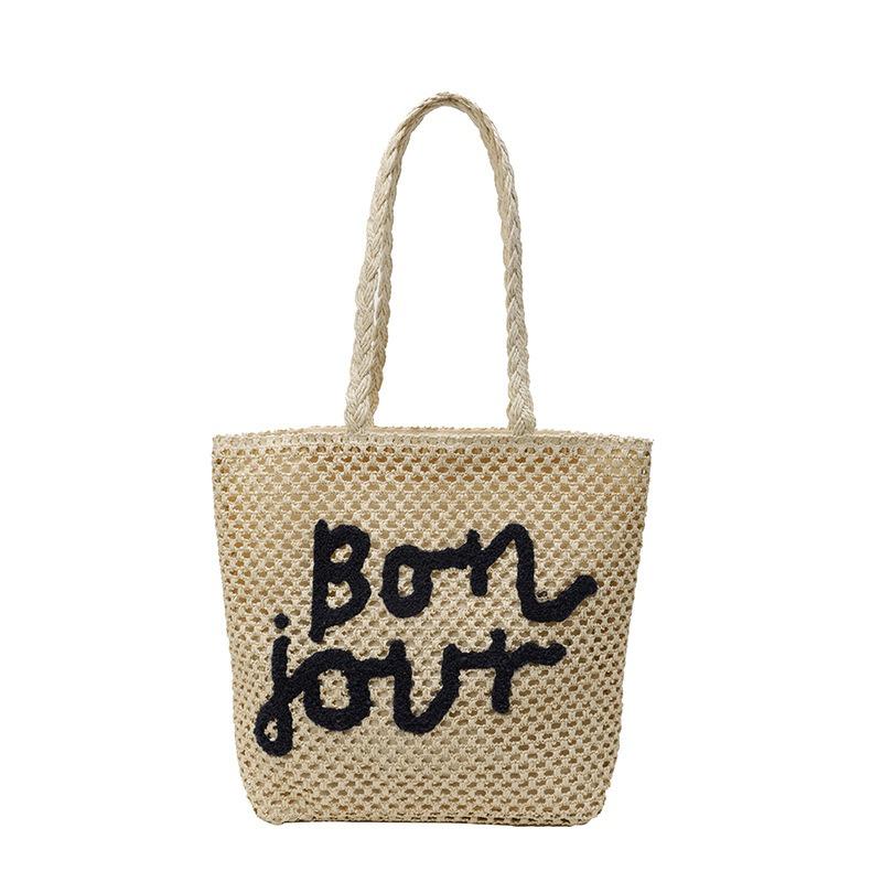 

Hollow shoulder straw bag new letter straw bag woven bag vacation wind beach bag versatile women s bag